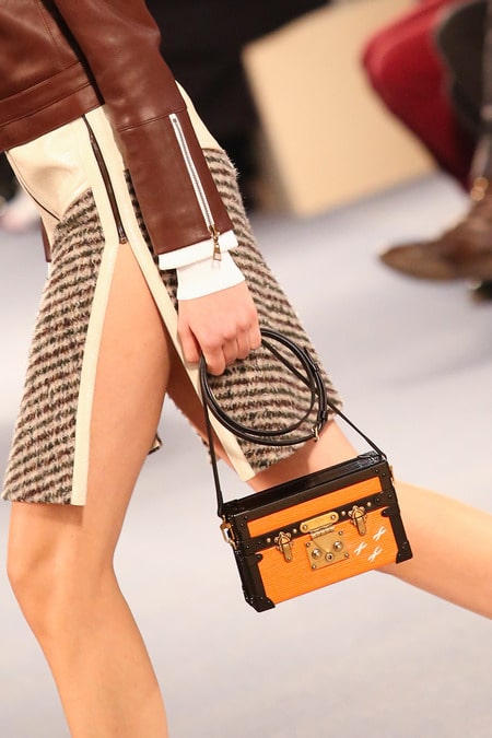 Louis Vuitton on X: .@NataSupernova wearing #FW14 #LouisVuitton and the  Petite Malle handbag in orange Epi Leather  / X