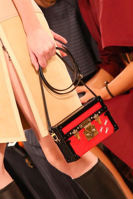 Louis Vuitton on X: .@NataSupernova wearing #FW14 #LouisVuitton and the Petite  Malle handbag in orange Epi Leather  / X