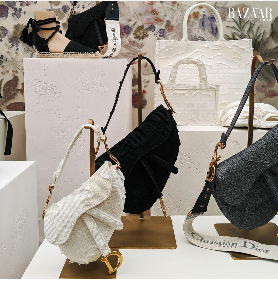 White summer dress and Dior Saddle Bag. Check out Designdschungel on  Instagram.
